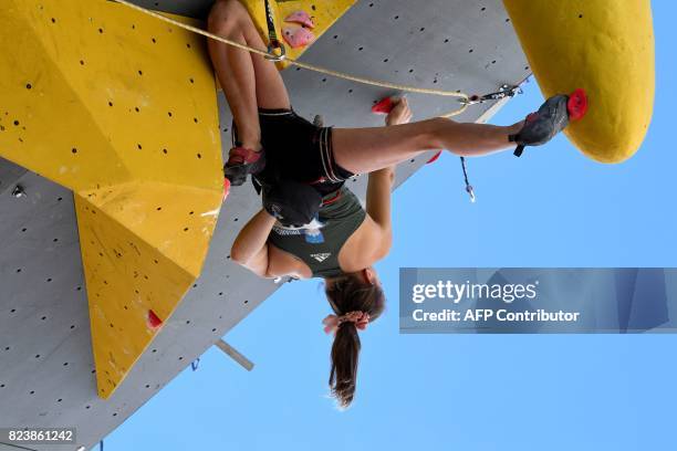 Slovenia's Janja Garnbret - women's world number one - climbs during the semi-final of 2017 International Federation of Sport Climbing Climbing World...