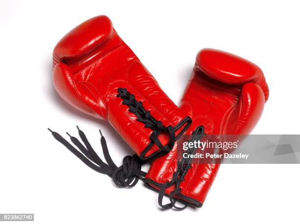 professional red boxing gloves on white background - boxing gloves stock pictures, royalty-free photos & images