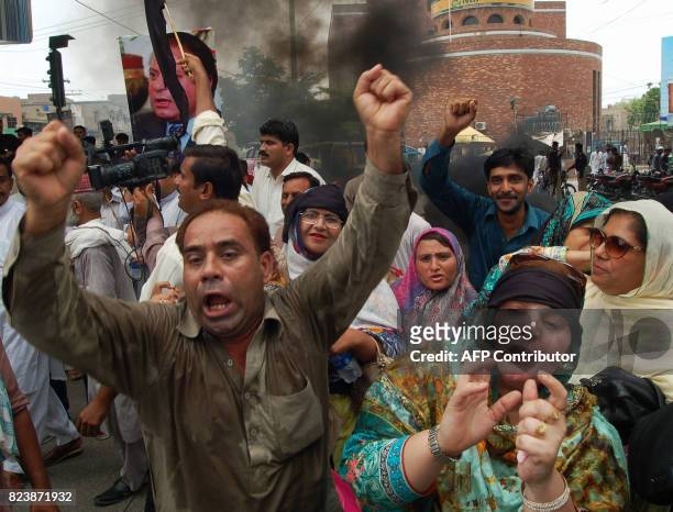 Activists of Pakistan Muslim League Nawaz protest against the Supreme Court decision against Pakistan's Prime Minister Nawaz Sharif in Multan on July...