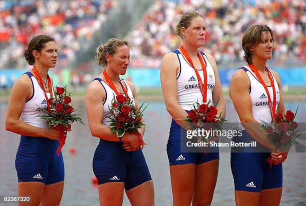 Annie Vernon, Debbie Flood, Frances Houghton and Katherine Grainger of Great Britain celebrate their silver medal in the Women's Quadruple Sculls at...