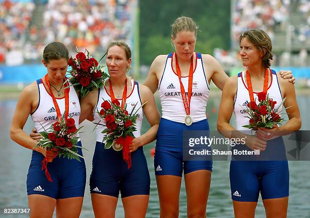 Annie Vernon, Debbie Flood, Frances Houghton and Katherine Grainger of Great Britain celebrate their silver medal in the Women's Quadruple Sculls at...