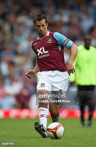 Lucas Neill of West Ham United in action during the Barclays Premier League match between West Ham United and Wigan Athletic at Upton Park on August...