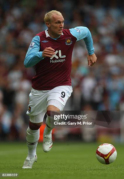 Dean Ashton of West Ham United in action during the Barclays Premier League match between West Ham United and Wigan Athletic at Upton Park on August...