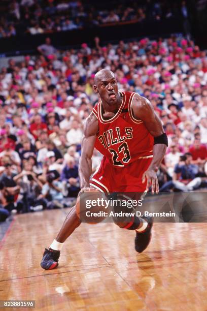 Michael Jordan of the Chicago Bulls drives to the basket against the Portland Trail Blazers in Game Three of the NBA Finals at Memorial Coliseum on...