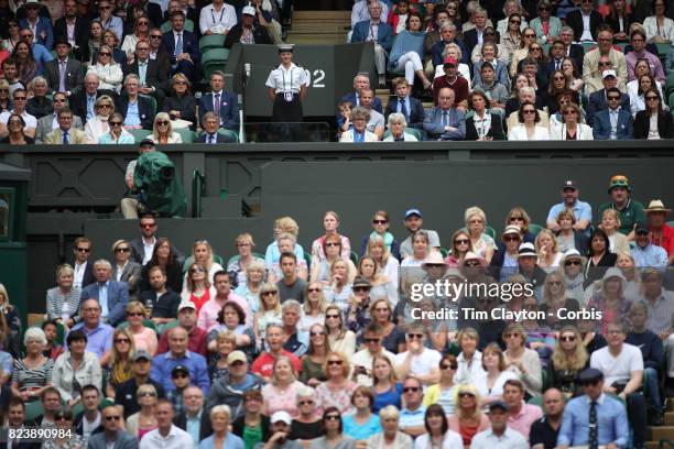 Able Seaman Henrietta Goodrum, , in her role as a service steward on Center Court during the Gentlemen's Singles Semi-finals of the Wimbledon Lawn...