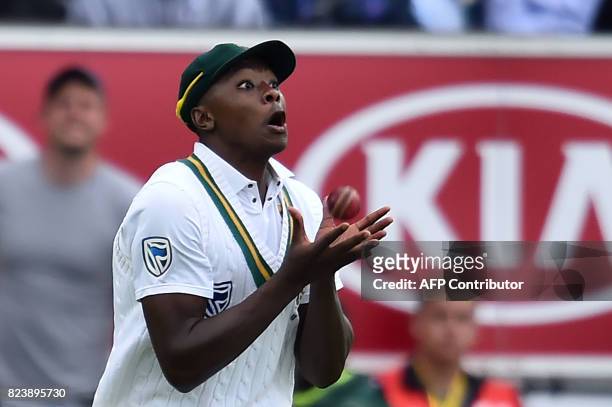 South Africa's Kagiso Rabada takes the catch to dismiss England's Ben Stokes for 112 off the bowling of South Africa's Morne Morkel on the second day...