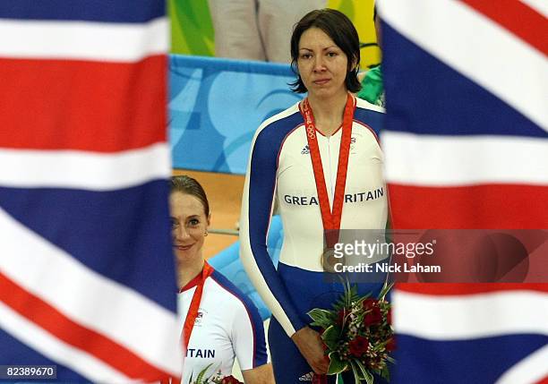 Gold medalist Rebecca Romero and silver medalist Wendy Houvenaghel of Great Britain look on after the women's individual pursuit track cycling final...
