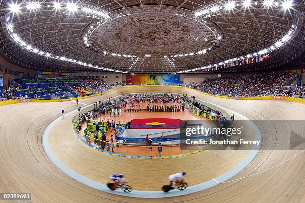 Cyclists compete during the track cycling event held at the Laoshan Velodrome during Day 9 of the 2008 Beijing Summer Olympic Games on August 17,...