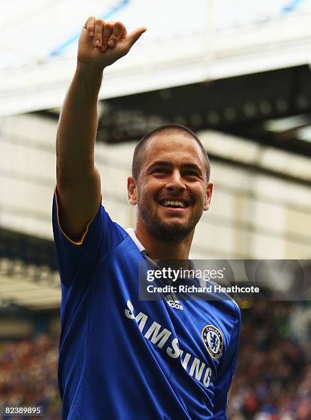 Joe Cole of Chelsea celebrates as he scores their first goal during the Barclays Premier League match between Chelsea and Portsmouth at Stamford...