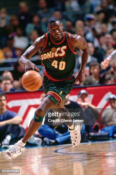 Shawn Kemp of the Seattle SuperSonics dribbles the ball up court against the Dallas Mavericks at the Reunion Arena in Dallas, Texas crica 1997. NOTE...