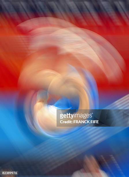 Israel's Alexandr Shatilov competes in the men's floor exercise final of the artistic gymnastics event of the Beijing 2008 Olympic Games in Beijing...