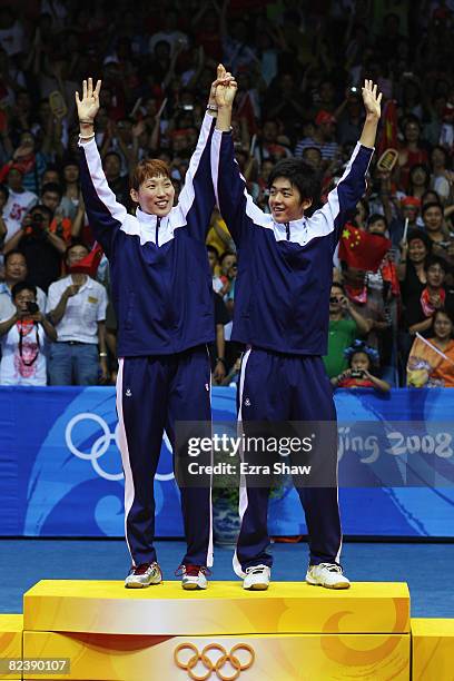 Gold medalists Lee Yongdae and Lee Hyojung of South Korea celebrate winning the Mixed Doubles Gold Medal Match against Nova Widianto and Liliyana of...
