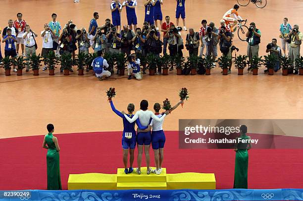 Silver medalist Wendy Houvenaghel of Great Britain, gold medalist Rebecca Romero of Great Britain and bronze medalist Lesya Kalitovska of Ukraine...