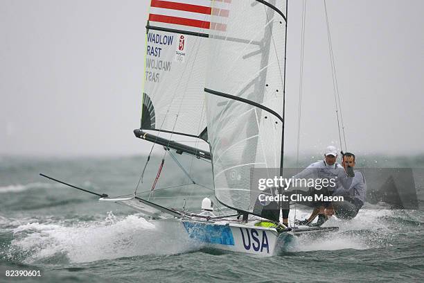 Tim Wadlow and Chris Rast of the United States of America compete in the 49er class race held at the Qingdao Olympic Sailing Center during day 9 of...