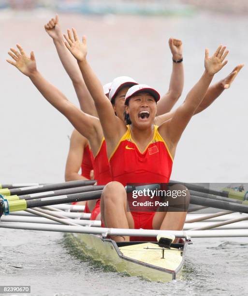 Tang Bin, Jin Ziwei, Xi Aihua and Zhang Yangyang of China celebrate their victory in the Women's Quadruple Sculls at the Shunyi Olympic...