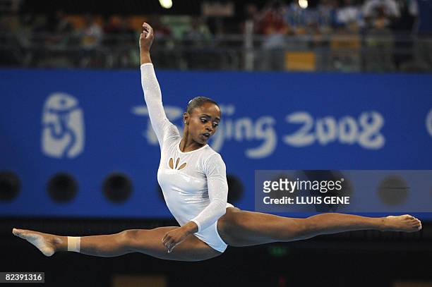 Brazil's Daiane Santos competes in the women's floor final of the artistic gymnastics event of the Beijing 2008 Olympic Games in Beijing on August...