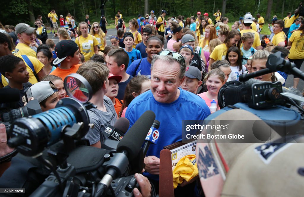 Plymouth Man Sets Record Pulling A Car While Walking On Hands