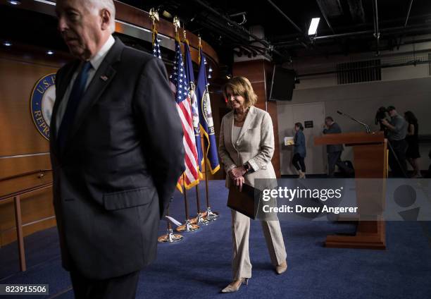 Rep. Steny Hoyer and House Minority Leader Nancy Pelosi exit a press conference regarding the Senate's defeat of the GOP health care plan, on Capitol...