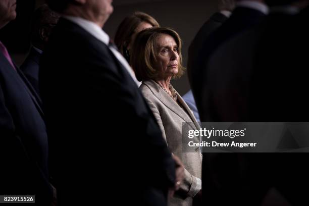 House Minority Leader Nancy Pelosi looks on during a press conference regarding the Senate's defeat of the GOP health care plan, on Capitol Hill,...