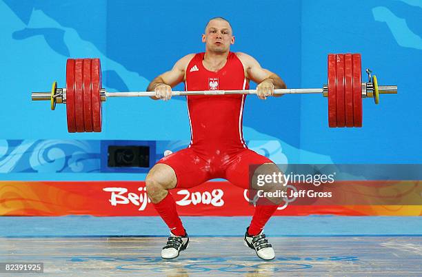 Szymon Kolecki of Poland fails to perform the final lift in the men's 94kg weightlifting event held at the Beijing University of Aeronautics &...