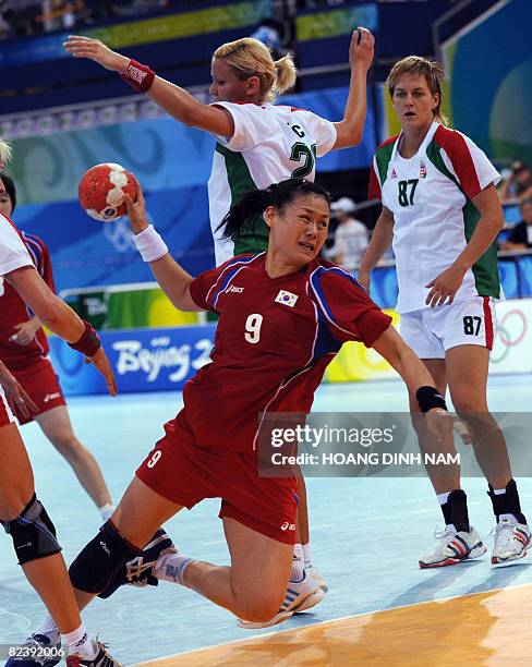 Kim Chayoun of South Korea shoots during the Beijing 2008 Olympic Games preliminary group B women's handball match against Hungary in Beijing on...