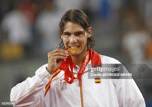 Gold medallist Rafael Nadal of Spain bit Gold medallist Rafael Nadal of Spain bit