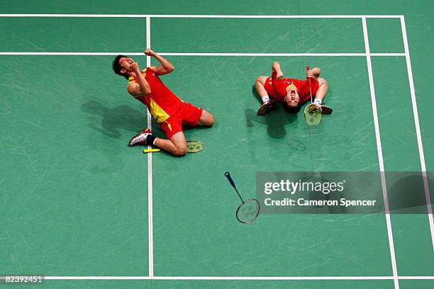 He Hanbin and Yu Yang of China celebrate winning the bronze medal after the Mixed Doubles Bronze Medal Match against Flandy Limpele and Vita Marissa...