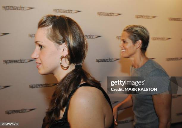 Swimmers Katie Hoff and Dara Torres arrive for a promotional event to celebrate the end of the Olympic swimming programme in Beijing on August 17,...