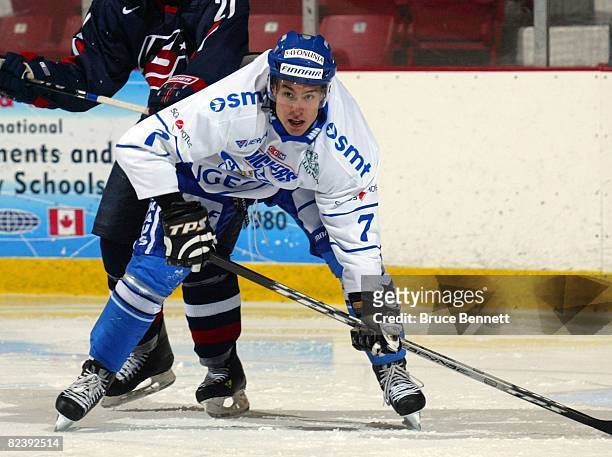Joonas Jarvinen of Team Finland jumps over the boards to play against Team USA at the USA Hockey National Junior Evaluation Camp on August 8, 2008 at...