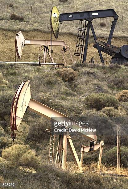 Pumps operate in the Kern River Oil Field, February 16 near Oildale, CA. In recent months the state Coastal Commission has been battling the federal...