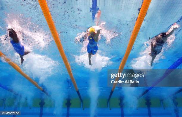 Simone Manuel of the United States, Sarah Sjostrom of Sweden and Mallory Comerford of the United States compete during the Women's 100m Freestyle...