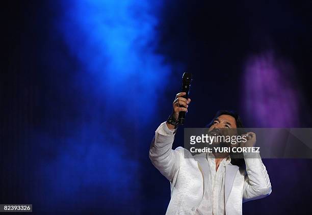 Mexican singer Marco Antonio Solis performs during a concert at the "Villa Olimpica Complex " on August 16, 2008 in Desamparados some 15 kilometers...