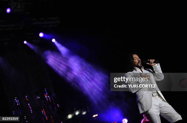 Mexican singer Marco Antonio Solis performs during a concert at the "Villa Olimpica Complex " on August 16, 2008 in Desamparados some 15 kilometers...