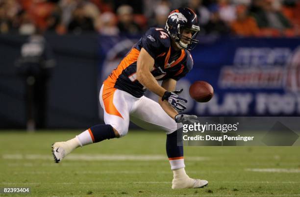 Wide receiver Brandon Stokley of the Denver Broncos attempts to make a reception against the Dallas Cowboys during preseason NFL action at Invesco...