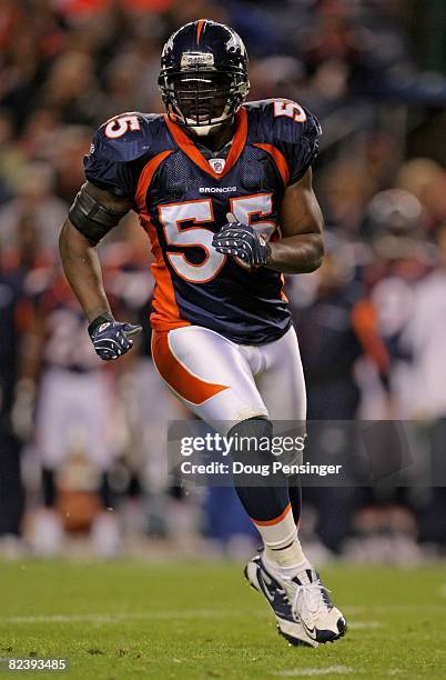 Linebacker D.J. Williams of the Denver Broncos defends against the Dallas Cowboys during preseason NFL action at Invesco Field at Mile High on August...