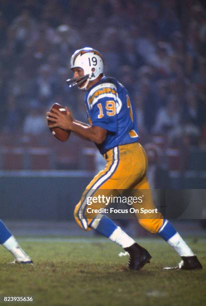 Quarterback Johnny Unitas of the San Diego Charger drops back to pass against the Los Angeles Rams during an NFL football game circa 1973 at Jack...