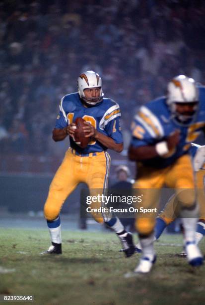 Quarterback Johnny Unitas of the San Diego Charger drops back to pass against the Los Angeles Rams during an NFL football game circa 1973 at Jack...