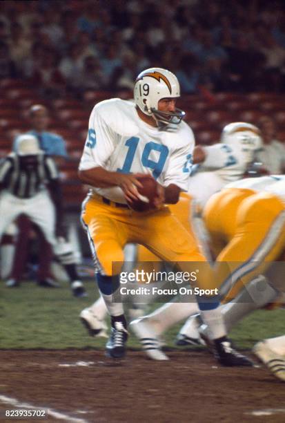 Quarterback Johnny Unitas of the San Diego Charger drops back to pass against the St. Louis Cardinals during an NFL football game circa 1973 at Jack...
