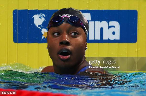 Simone Manuel of United States reacts after she wins the Women's 100m Freestyle during day fiifteen of the FINA World Championships at the Duna Arena...