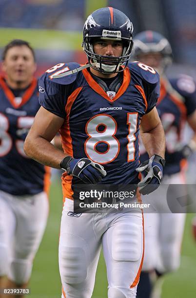 Tightend Nate Jackson of the Denver Broncos warms up prior to facing the Dallas Cowboys during preseason NFL action at Invesco Field at Mile High on...