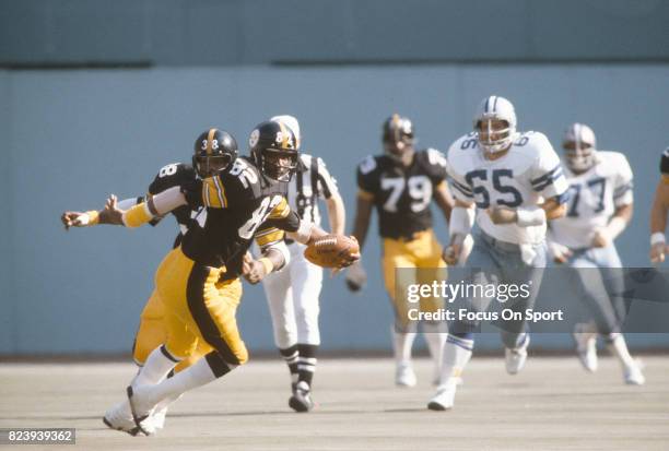 John Stallworth of the Pittsburgh Steelers runs with the ball against the Dallas Cowboys during an NFL football game October 28, 1979 at Three Rivers...