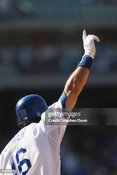 Andre Ethier of the Los Angeles Dodgers celebrates as he sees his walk off two run home run clear the fence in the bottom of the ninth inning against...