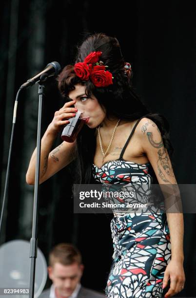 Amy Winehouse performs live on the V stage during Day Two of V Festival 2008 at Hylands Park on August 17, 2008 in Chelmsford, England.