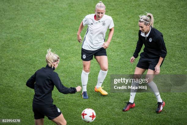 Kathrin Hendrich , Mandy Islacker and Lena Goessling of Germany during a training prior the Quarter Final on July 28, 2017 in Rotterdam, Netherlands.
