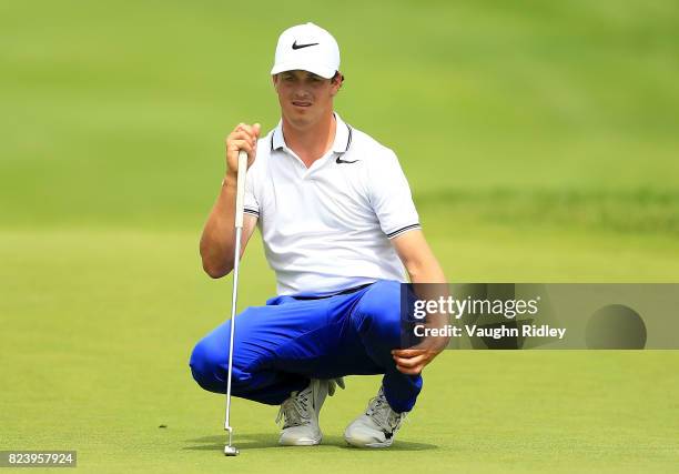 Cody Gribble of the United States lines up a putt on the eighth hole during the second round of the RBC Canadian Open at Glen Abbey Golf Club on July...