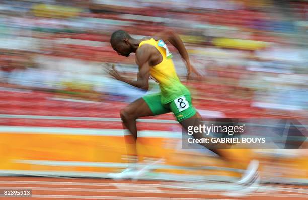 Jamaica's Michael Blackwood leaves the blocks during the first round of the men's 400m heats at the "Bird's Nest" National Stadium during the 2008...