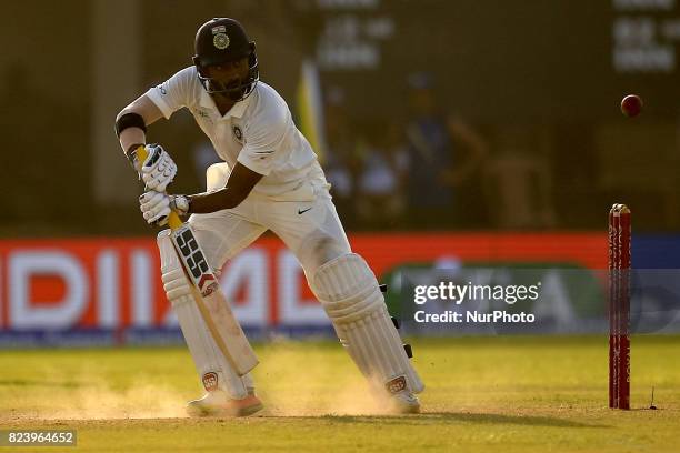 Indian cricketer Abhinav Mukund plays a shot during the 3rd Day's play in the 1st Test match between Sri Lanka and India at the Galle cricket...