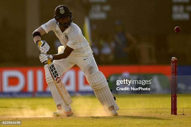 Indian cricketer Abhinav Mukund plays a shot during the 3rd Day's play in the 1st Test match between Sri Lanka and India at the Galle cricket...