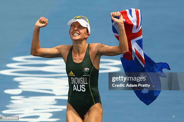 Emma Snowsill of Australia celebrates after taking the gold medal in the women's triathlon event at the Triathlon Venue on Day 10 of the Beijing 2008...