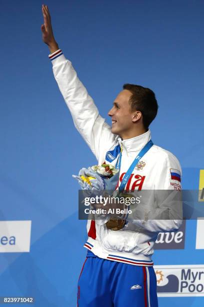 Gold medalist Anton Chupkov of Russia poses with the medal won during the Men's 200m Breaststroke final on day fifteen of the Budapest 2017 FINA...